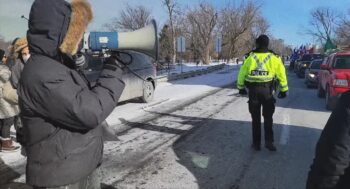 | Police asked for the convoy supporters to be let through to return to their supply base but the blockade held the line Photo James Hutt | MR Online