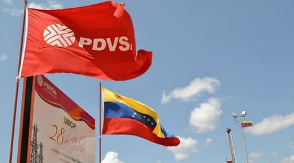 | PDVSA flag next to Venezuelan flag near a PDVSA facility File photo | MR Online