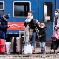 Ukrainian ‘refugees’ wait at a train station in Zahony, Hungary, a border town with Ukraine, February 26, 2022 (Photo: AP)