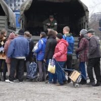 Residents of Mariupol receiving humanitarian aid from the Russian army