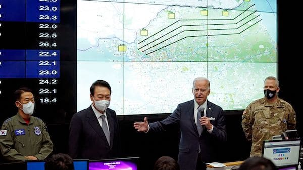 | US President Joe Biden center right with South Korean President Yoon Suk Yeol center left speaks at the Combat Operations Floor of the Osan Air Base Sunday May 22 2022 in Pyeongtaek South Korea AP PhotoEvan Vucci | MR Online