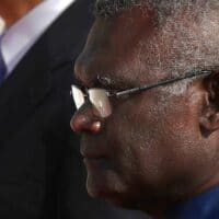 Solomon Islands Prime Minister Manasseh Sogavare walks with Chinese Premier Li Keqiang during a welcome ceremony at the Great Hall of the People in Beijing, Oct. 9, 2019. [AP Photo/Mark Schiefelbein]