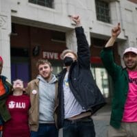 Amazon Labor Union (ALU) members celebrate after the voting results to unionize Amazon warehouse on Staten Island, N.Y. on Friday, April 1, 2022. Image: AP