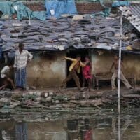 Children playing in a slum in Allahabad, India, October 3, 2011. Photo: AP.