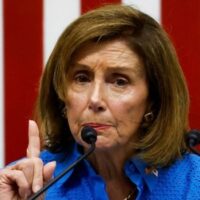 Nancy Pelosi at Tokyo press conference explaining her "connection" to China (Photo: Issei Kato/Reuters)