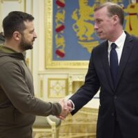 Ukrainian President Volodymyr Zelenskyy, left, and White House national security adviser Jake Sullivan shake hands during their meeting in Kyiv, Ukraine, Friday, November 4, 2022