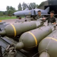 South Korean Air Force personnel prepare to load U.S.-made and supplied cluster bombs — internationally banned weapons — during an exercise in 2017 at an air base in Suwon, South Korea. Photo: New York Times