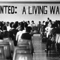 Striking Frame Group workers meet for a report back on negotiations with management in Bolton Hall in 1973. Credit: David Hemson Collection, University of Cape Town Libraries