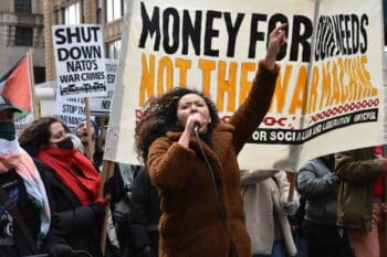 | Protestors march through Midtown Manhattan Liberation photo | MR Online