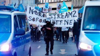 | Police accompany a protest against sanctions on Russia while a banner with the inscription Open Nordstream 2 immediately is held September 05 2022 Sebastian Willnow | DPA via AP | MR Online