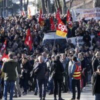 Demonstrators against French government pension reforms take part to a protest march, in Bayonne, southwestern France, Tuesday, Jan. 31, 2023.