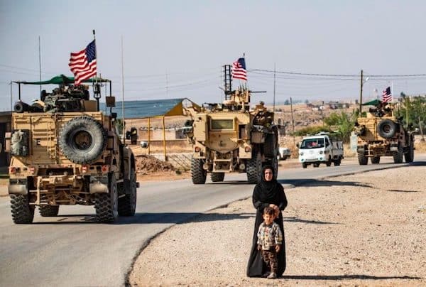 | A convoy of US armoured vehicles patrolling the occupied territories of northeastern Syria bordering Turkiye File photo | MR Online