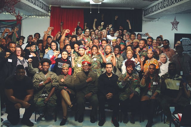 | Attendees of the African Peoples Socialist Party APSP Plenary 2017 In the front row includes recently indicted defendants Gazi Kodzo first from left with fist on chest and Omali Yeshitela third from left with red beret credit The Burning Spear | MR Online