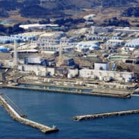 An aerial view shows the storage tanks for treated water at the tsunami-crippled Fukushima Daiichi nuclear power plant in Okuma town, Fukushima prefecture, Japan Feb 13, 2021, in this photo taken by Kyodo. [Photo/Agencies]