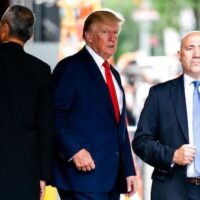 Former President Donald Trump departs Trump Tower, Wednesday, Aug. 10, 2022, in New York, on his way to the New York attorney general's office for a deposition in a civil investigation. [AP Photo/Julia Nikhinson]