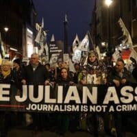 Protesters, led by Stella Assange and Kristin Hrafnsson, demand the release of Julian Assange in Westminster, London, UK, February 11, 2023 (Photo: Dan Kitwood/Getty Images via RT)