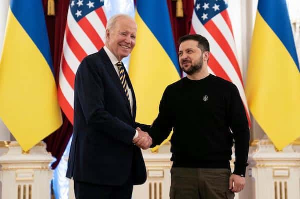 | President Joe Biden L shakes hands with Ukrainian President Volodymyr Zelensky at the Mariinsky Palace in Kyiv on 20 February 2023 AFP | MR Online