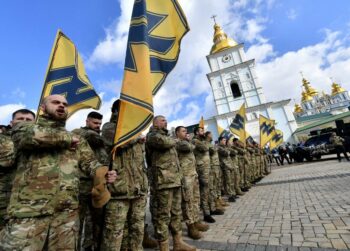 | Veterans of Ukraine | MR Online's far-right Azov volunteer battalion during a rally called 'No surrender' in Kyiv on 14 March 2020 (AFP)