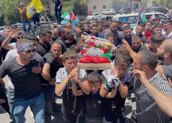 | PALESTINIAN CHILDREN CARRY THE BODY OF 3 YEAR OLD MOHAMMED AL TAMIMI WHO WAS SHOT DEAD BY ISRAELI FORCES IN THE WEST BANK VILLAGE OF NABI SALEH JUNE 6 2023 PHOTO AHMAD AROURIAPA IMAGES | MR Online