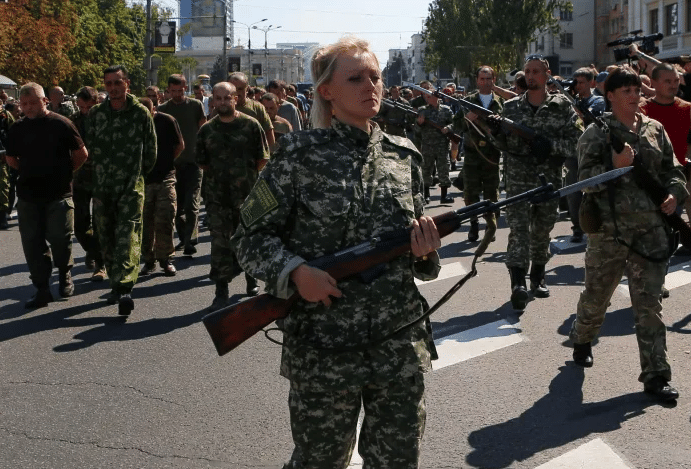 | Members of the Donetsk militia escort Ukrainian prisoners of war in the Donbas The militias have been fighting the Ukrainian Army backed by the US since the war really started in 2014 Source mediumcom | MR Online