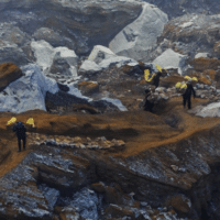 Indonesian sulfur miners carrying their 90 kilogram loads of sulfur from the floor of the volcano to crater rim, Ijen Volcano, Banyuwangi Regency, East Java, February 9, 2015. Photo by Uwe Aranas/CEPhoto/Flickr.