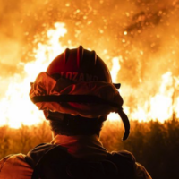 A CalFire firefighter watches as the Rabbit Fire spreads on July 14, 2023. (Photo: Jon Putman/SOPA Images/LightRocket via Getty Images)