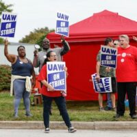 | UAW members and workers at the Mopar Parts Center Line in Center Line Michigan hold signs outside the facility after walking off their jobs at noon on September 22 2023 PHOTO BY KAMIL KRZACZYNSKI AFP | MR Online