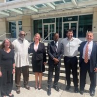 | Members of the Uhuru 3 and their defense lawyers outside the Sam Gibbons US courthouse in Tampa Florida | MR Online