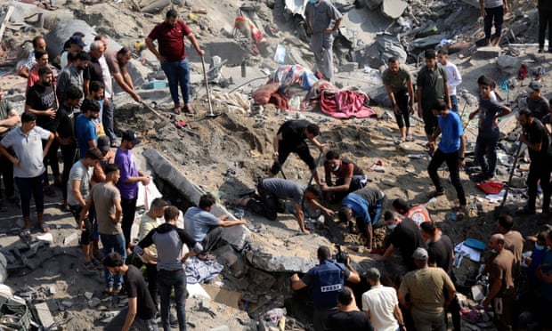 | Palestinians work in the debris of buildings targeted by Israeli airstrikes in Jabalia refugee camp northern Gaza Nov 1 2023 | MR Online