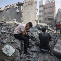 | A young person mourning after an Israeli attack that struck a refugee camp in Gaza City on Nov 2 2023 So far more than 9000 Palestinians have been killed by the Israeli military PHOTO BY MUSTAFA HASSONAANADOLU VIA GETTY IMAGES | MR Online