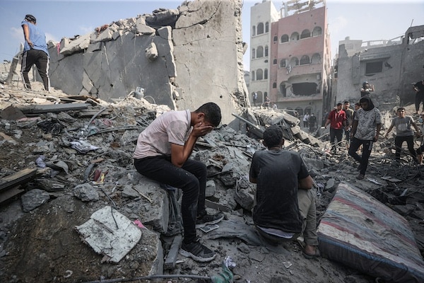 | A young person mourning after an Israeli attack that struck a refugee camp in Gaza City on Nov 2 2023 So far more than 9000 Palestinians have been killed by the Israeli military PHOTO BY MUSTAFA HASSONAANADOLU VIA GETTY IMAGES | MR Online