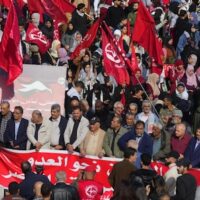 Supporters of the Popular Front for the Liberation of Palestine (PFLP), hold Palestinian and their group flags during a protest in solidarity with the Palestinian people in Gaza Strip, and the 56th anniversary of the group's founding, in front of the headquarters of U.N. Economic and Social Commission for Western Asia (ESCWA) in Beirut, Lebanon, December 17, 2023