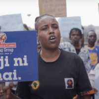 Photo courtesy of Mathare Social Justice Centre. The sign in the foreground reads “water is life.”