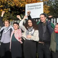 | Palestine Action defendants including Huda Ammori 4th from right outside court Photo Martin Pope via Getty Declassified UK | MR Online