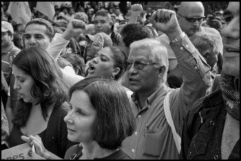 | Benedicto Martínez marches in a demonstration of independent trade unions farmer organizations and the left wing Party of the Democratic Revolution to Mexico City | MR Online's main square, the Zocalo, on the 20th anniversary of the implementation of NAFTA. The march included members of U.S. and Canadian unions and organizations protesting NAFTA. (David Bacon)