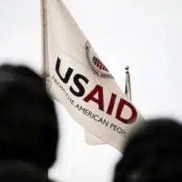 | An Agency for International Development flag flies in front of USAID headquarters in Washington DC Graeme Sloan | Sipa via AP | MR Online