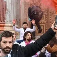 Scientists engage in civil disobedience on the steps of the Congress of Deputies in Madrid, Spain on April 6, 2022. (Photo: Scientist Rebellion)