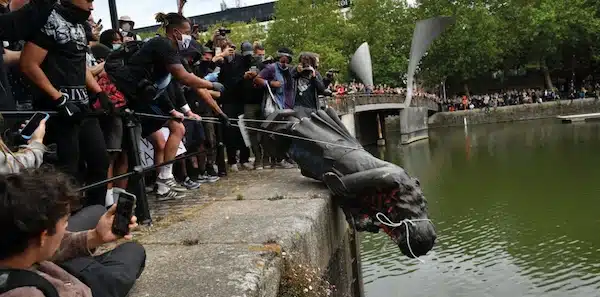 | Protesters throw the statue of merchant and slave trader Edward Colston into Bristol harbour during a Black Lives Matter protest rally 2020 | MR Online