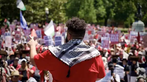 | Mohammad an organizer with PYM addresses the crowd on June 8 Photo PYM | MR Online