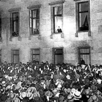 Adolf Hitler, at a window of the Reich Chancellery, receives an ovation on the evening of his inauguration as chancellor, Jan. 30, 1933. (Robert Sennecke, German Federal Archive, Wikimedia Commons, Public domain)