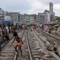 Homes beside the railroad tracks in Dhaka, Bangladesh. Dhaka is the capital of Bangladesh.