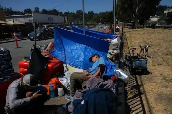 | A group of unhoused people camp outside the Housing Matters shelter in Santa Cruz on Aug 7 2024 | MR Online