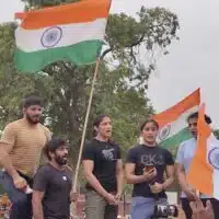 Wrestlers address the crowd at the candlelight march in Delhi in May 2023. (Photo: Surangya)