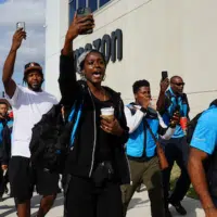 | Phones held aloft to record the moment delivery drivers marched on their bosses at three Amazon contractors to announce their new union To march today and walk in there with everyone behind us all of us standing together as a union it was so amazing said Latrice Shadae Johnson Photo Teamsters | MR Online