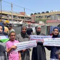 Palestinian children in Rafah, Gaza, show their gratitude to pro-Palestinian protesters in the US on April 28, 2024. (Photo credit: Tareq Alhelou/CNN)