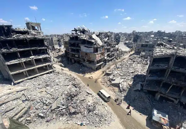 | PEOPLE MAKE THEIR WAY AMID THE RUBBLE OF BUILDINGS DESTROYED DURING ISRAELI BOMBARDMENT OF THE THE JABALIA REFUGEE ON AUGUST 31 2024 PHOTO HADI DAOUD APA IMAGES | MR Online