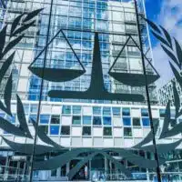 The logo of the International Criminal Court at the entrance of the Hague.