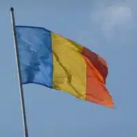 | Romania National tricolor flag on clear Bucharest | MR Online