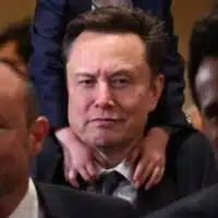 Tesla CEO Elon Musk (C), co-chair of the newly created Department of Government Efficiency (DOGE), carries his son "X" on his shoulders before a meeting with members of Congress at the US Capitol in Washington, DC, on December 5, 2024. (Photo by Roberto Schmidt/AFP via Getty Images)