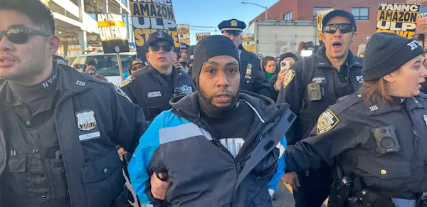 | At the DBK4 delivery station in Queens New York cops swarmed and arrested an Amazon driver who stopped his van in support of the strike Then they forcibly broke the picket line Photo Luis Feliz Leon | MR Online